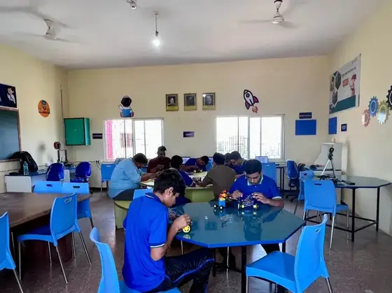 Students working in an AI and robotics lab