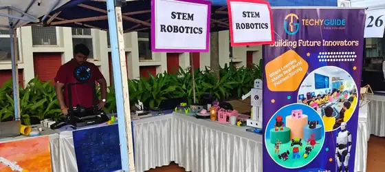 TechyGuide STEM robotics stall at a school event
