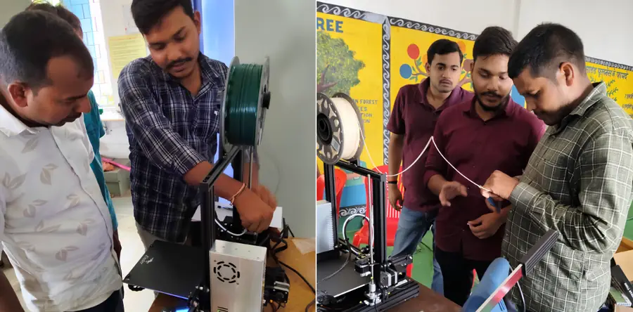 Trainers helping teachers set up a 3D printer in a school lab